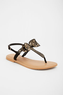 black sandals with a bow
