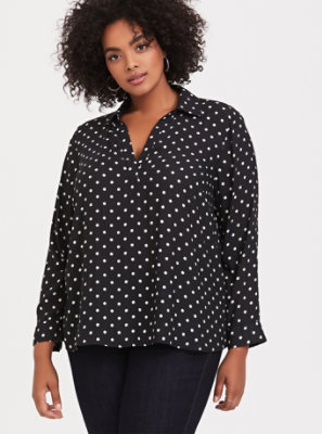 white blouse with black polka dots