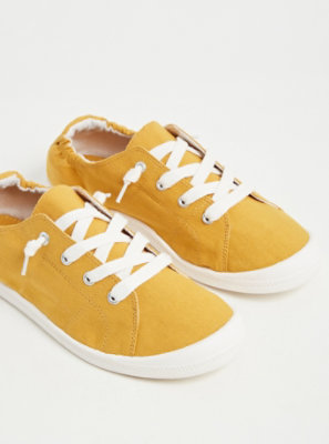 mustard yellow tennis shoes
